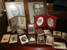 A quantity of old framed photographs.