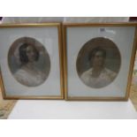 A pair of framed and glazed oval portraits of the Misses Makenzie of Seaforth, circa 1850's. COLLECT