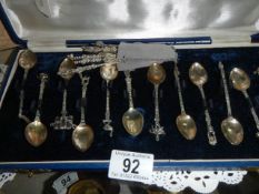 A cased set of six silver teaspoons and six other silver teaspoons.