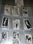 A collection of film star cigarette cards.