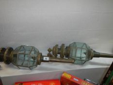 A pair of good quality modern brass carriage lamps.