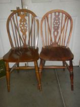 A good pair of wheel back kitchen chairs. COLLECT ONLY.