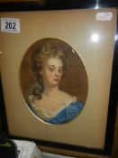 A framed and glazed oval portrait of a lady, COLLECT ONLY.