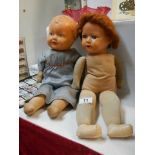 Two 1950's dolls with cloth bodies.
