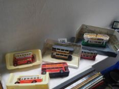 A quantity of die cast buses.