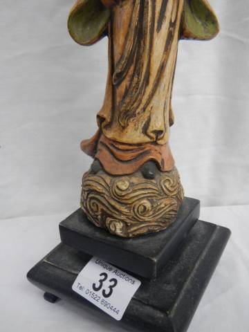 A carved wood oriental figure. - Image 3 of 5