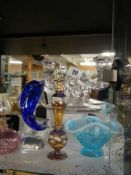 A mixed lot of coloured glass including scent bottles.
