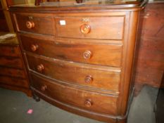 A two over three mahogany bow front chest of drawers, COLLECT ONLY.