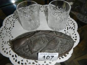 A Hunting related paperweight and two whisky tumblers engraved with hunting scenes.