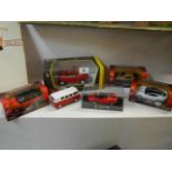Five boxed and one unboxed die cast vehicles.