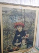 A framed and gloazed Pierre August Renoir print entitled 'On The Terrace', COLLECT ONLY.
