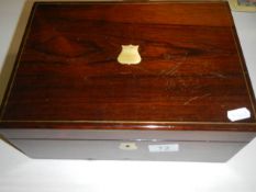 A mahogany writing box.