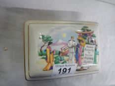 A porcelain item featuring Madame Butterfly.