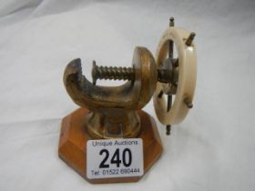 A ship's wheel nutcracker.