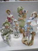 Six assorted porcelain figures.