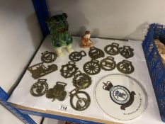 A mixed lot including horse brasses, dog of foo 1 ear a/f, a plaque for RAF hospital Nocton Hall