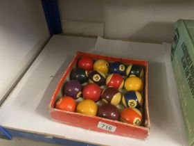 A box containing billiard balls