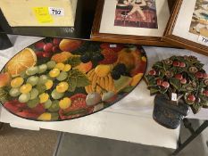 A vintage fruit tray and cherry tree wall plaque