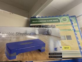 A Crane Aerobic stepper in box, a 6 pack of multi purpose floor mats COLLECT ONLY