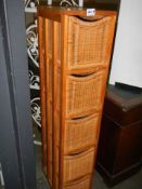 A tall wicker five drawer unit. COLLECT ONLY.