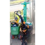 A large quantity of garden tools / hose