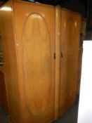 A good quality mid 20th century serpentine front wardrobe, COLLECT ONLY.