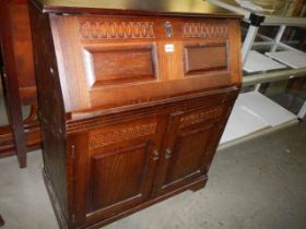 A mid 20th century oak bureau, COLLECT ONLY