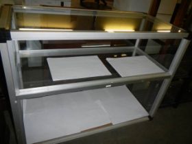 A double shelf glass counter, COLLECT ONLY.