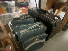 A suitcase and 2 Carlton International flight bags COLLECT ONLY