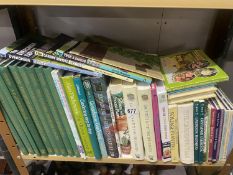 A shelf of books on gardening