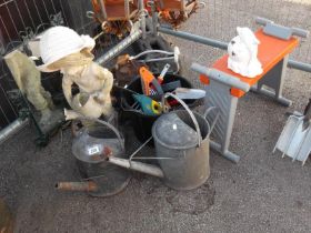 A large lot of garden tools including Watering can