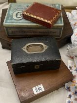 A selection of antique and vintage wooden boxes and tins