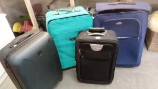 4 x wheeled suitcases
