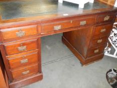 An Edwardian three piece double pedestal desk, COLLECT ONLY.