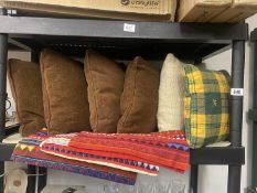 A quantity of cushions and cushion covers