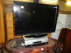 A Hitachi television with DVD player. COLLECT ONLY.