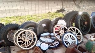 A large quantity of wheels. Various sizes