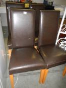 A set of four faux leather dining chairs, COLLECT ONLY.