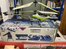 A T. series helicopter, no controls & E flite blade CX3 helicopter, both untested