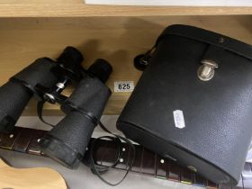 A Mark Scheffel cased set of binoculars
