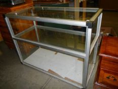 A glazed shop cabinet with shelf, COLLECT ONLY.