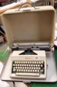 An Olympia cased typewriter
