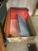 A box of index binders, books and other items