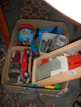 A box of assorted toys including old Lego