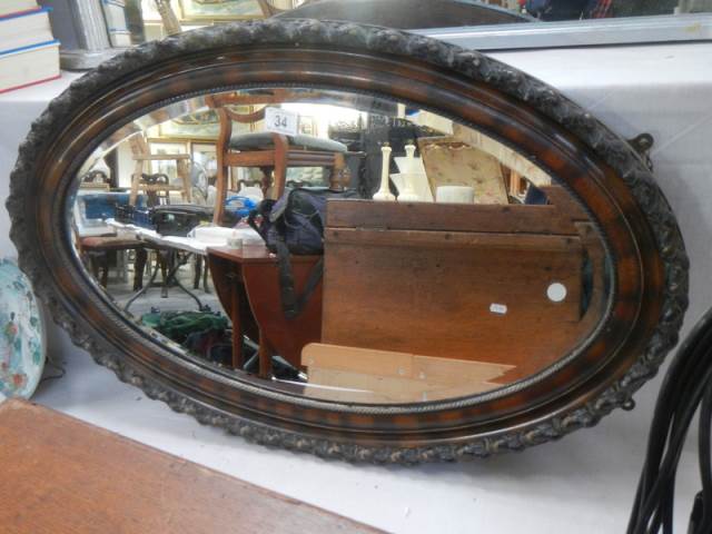 An oval framed bevel edged mirror, COLLECT ONLY. - Image 2 of 2