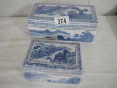 Two blue and white Chinese porcelain boxes.