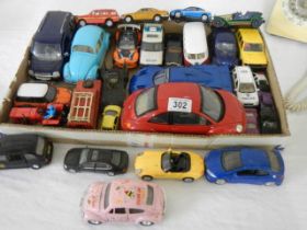 A mixed lot of die cast vehicles.