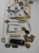 A mixed lot of badges etc.,