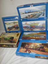 Six railway related jigsaw puzzles.