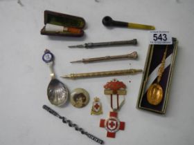 A mixed lot including propelling pencils, spoons etc.,